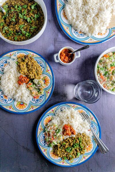 Lentil curry, rice and a side salad, can all be made under Dh35. Courtesy of Haiya Tariq, @passmethedimsum