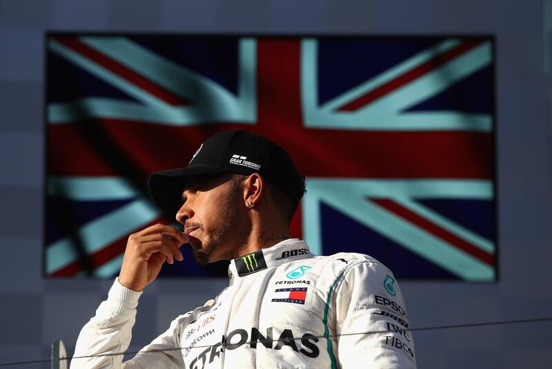MELBOURNE, AUSTRALIA - MARCH 25:  Second placed Lewis Hamilton of Great Britain and Mercedes GP on the podium during the Australian Formula One Grand Prix at Albert Park on March 25, 2018 in Melbourne, Australia.  (Photo by Clive Mason/Getty Images)