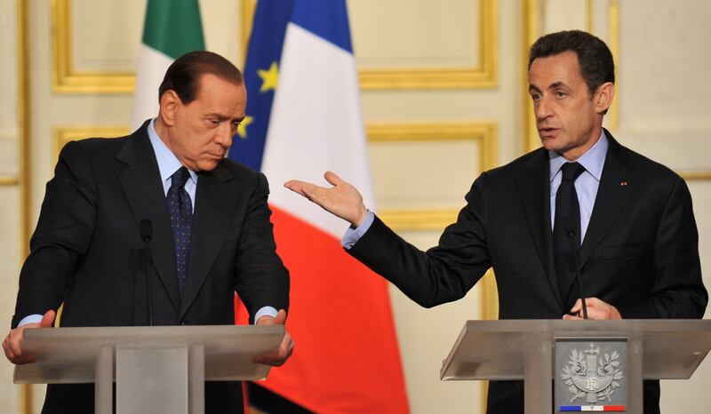 Berlusconi with then French President Nicolas Sarkozy at the Elysee Palace in Paris in 2010. Getty