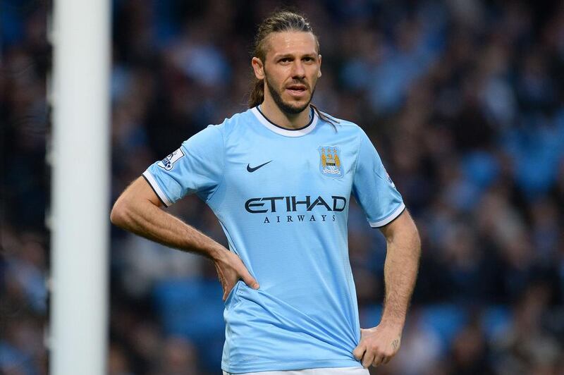 Centre-back: Martin Demichelis, Manchester City. The one-man disaster area conceded a penalty needlessly as Wigan beat City. Andrew Yates / AFP