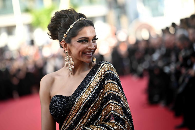 On Instagram, Sabyasachi Mukherjee, the designer behind the eponymous label, said the Bengal tiger couture sari 'celebrates heritage Indian crafts and techniques through a modern lens.' AFP
