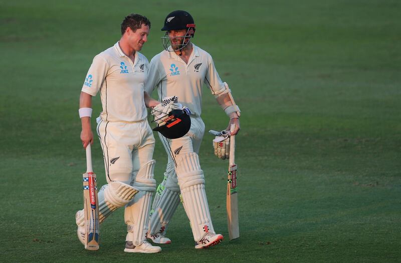 New Zealand's batsmen, Henry Nicholls, left, and Kane Williamson talk as they leave the pitch at the end of forth day in their test match against Pakistan in Abu Dhabi, United Arab Emirates, Thursday, Dec. 6, 2018. (AP Photo/Kamran Jebreili)