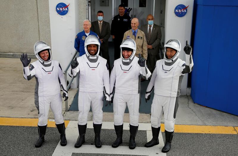 Crew members of a SpaceX Falcon 9 rocket commander Mike Hopkins, Victor Glover, Shannon Walker and Japanese astronaut Soichi Noguchi, gesture as they depart for the launch pad for the first operational NASA commercial crew mission at Kennedy Space Centre in Cape Canaveral, Florida. Reuters