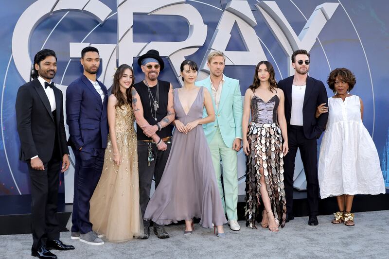 The cast of 'The Gray Man' at the Hollywood premiere. From left, Dhanush, Rege-Jean Page, Julia Butters, Billy Bob Thornton, Jessica Henwick, Ryan Gosling, Ana de Armas, Chris Evans and Alfre Woodard. AFP
