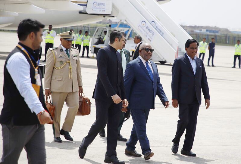 President of the Comoros and chairman of the African Union  Azali Assoumani, second right, is welcomed to Delhi ahead of the G20 summit. EPA