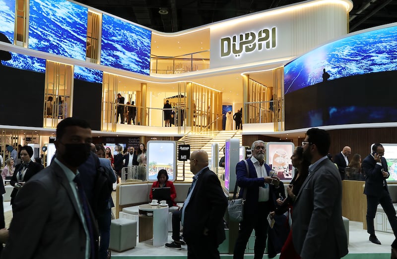 Visitors at the Dubai stand on the third day of the Arabian Travel Market held at Dubai World Trade Centre. Pawan Singh / The National