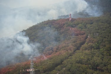 An aerial view of lines of fire retardant during a flight over Kurrajong Heights with Australian Prime Minister Scott Morrison (unseen) as he tours bushfire-affected regions of the Blue Mountains, west of Sydney, New South Wales (NSW), Australia, 23 December 2019. EPA