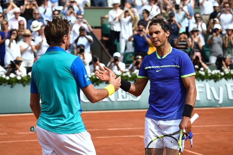 Rafael Nadal shakes hands with Stanislas Wawrinka after the match. AFP