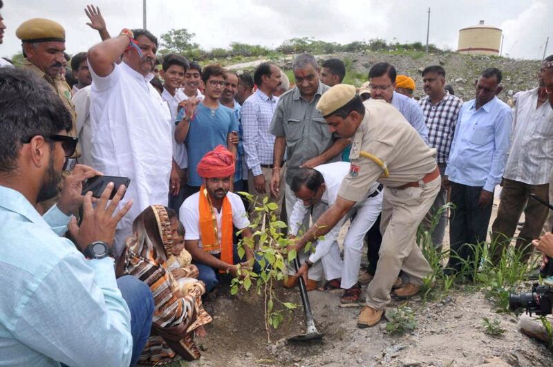 GC Bhupendra and Santosh Paliwal plant trees to celebration birth of their daughter Muskaan in Piplantri village in the desert state of Rajasthan. Picture credit- Bhupendra Paliwal