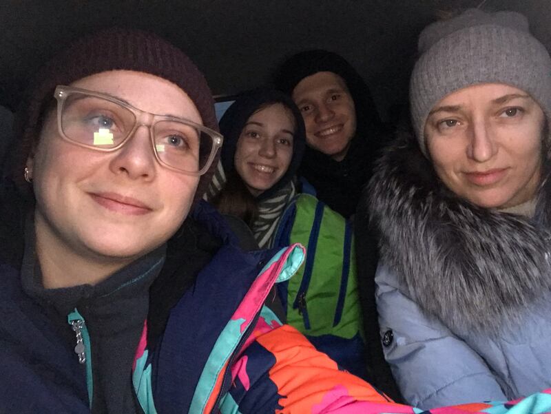 Ms Moroz (second from left) travelling with her mother (extreme right) the day before they were forced to spend the night in the car without heating and with temperatures at minus 10°C. Photo: Tetiana Moroz