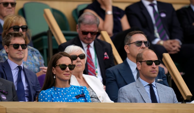 Prince William and Kate, Duchess of Cambridge sit in the Royal box on Centre Court to watch the quarterfinal match between Novak Djokovic and Jannik Sinner. AP