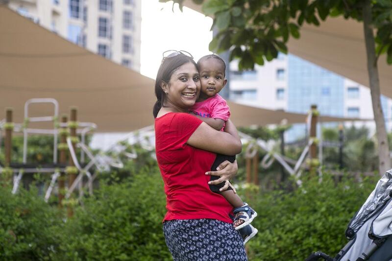 Minu Mathews with her son, Caleb. Reem Mohammed / The National 