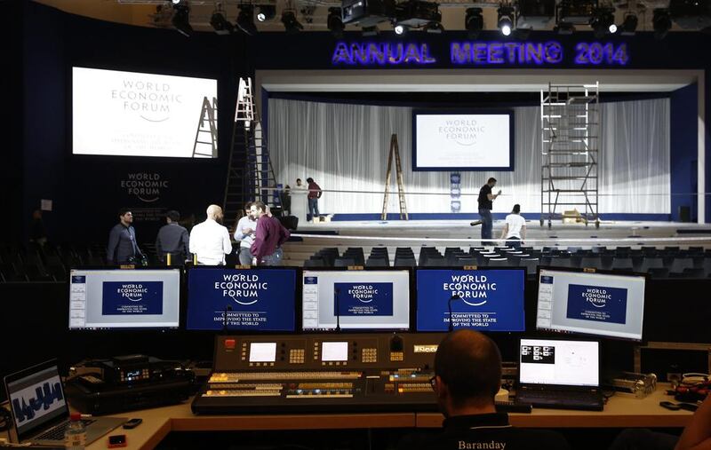 World Economic Forum logos (WEF) sit on the screens of TV producer's computers in an auditorium inside the Congress Centre ahead of the World Economic Forum (WEF) in Davos, Switzerland. Simon Dawson /Bloomberg