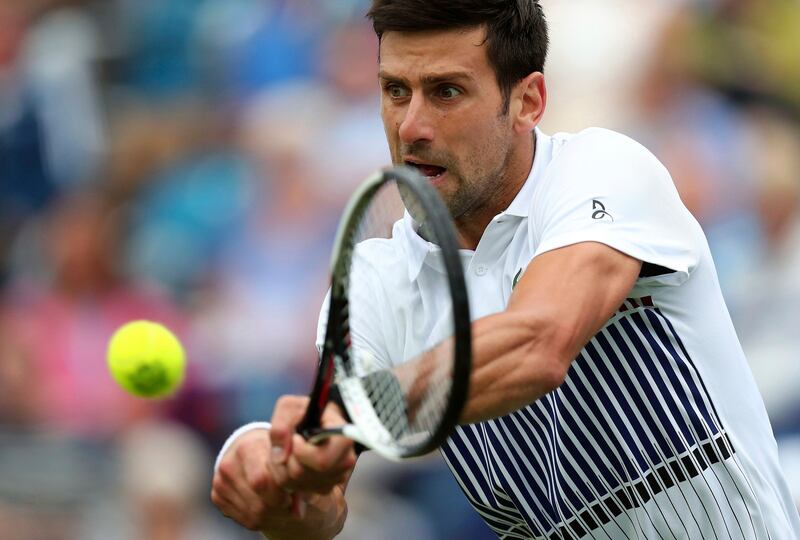 Serbia's Novak Djokovic plays a return to Canada's Vasek Pospisil during their quarterfinal match on day five of the AEGON International tennis tournament at Devonshire Park, Eastbourne, England, Wednesday June 28, 2017. (Gareth Fuller/PA via AP)