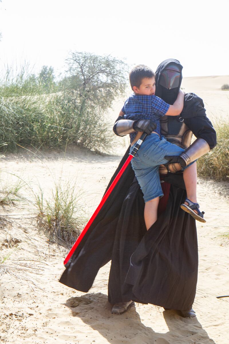 Sam with Darth Revan, a powerful Sith. The costume is worn by Pawel Rostworowski, who leads the Rub Al-Kahli Spire of The Dark Empire. 