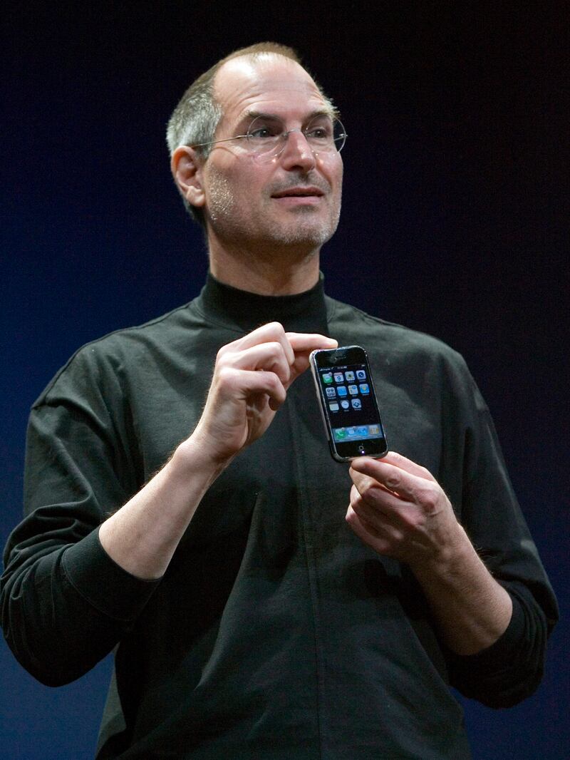 Steve Jobs reveals the new Apple iPhone before its introduction for the first time in the United States, on June 29, 2007. John G. Mabanglo / EPA