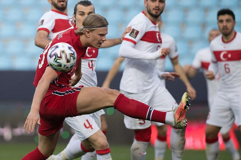 Norway's forward Erling Braut Haaland misses the ball against Turkey. AFP