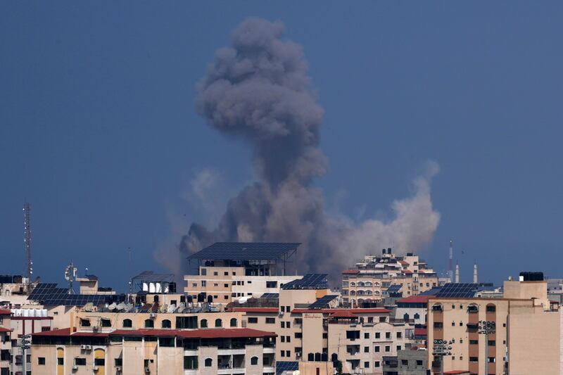 Smoke rises from an air strike on Gaza City on Sunday as Israel responded to a deadly attack launched by Hamas militants a day earlier. AP Photo