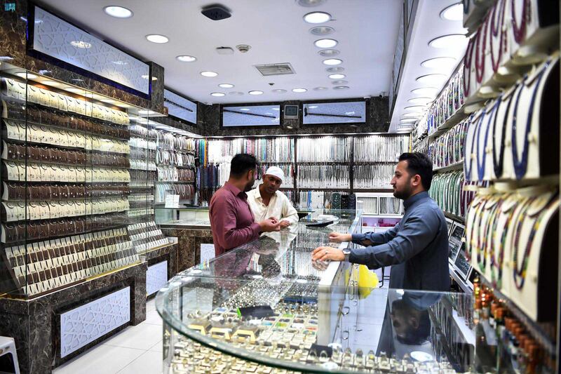Shoppers visit a store in Madinah 