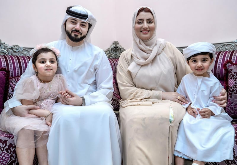 Sultan Al Shamsi and wife, Shayma with children, Noora, four and Rashid, three. May 30, 2021.  Victor Besa / The National.
Reporter:  Shireena Al Nowais for News