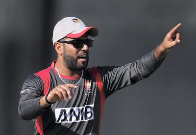 Dubai, United Arab Emirates - January 31, 2019: UAE's captain Mohammad Naveed directs his field in the the match between the UAE and Nepal in an international T20 series. Thursday, January 31st, 2019 at ICC, Dubai. Chris Whiteoak/The National