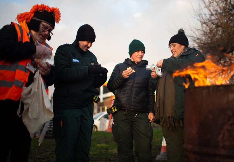 Ambulance workers on the picket line. EPA