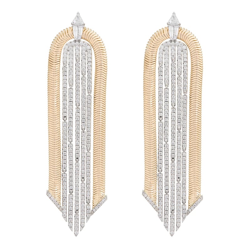 A pair of diamond and gold pendant earrings by newcomer designer Nikos Koulis
