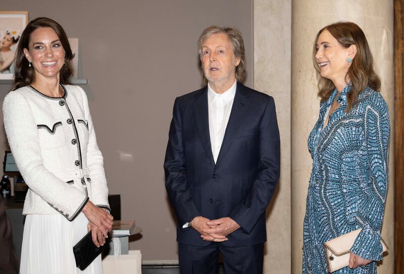The Princess of Wales meets musician Paul McCartney and his wife Nancy Shevell at the National Portrait Gallery. Reuters