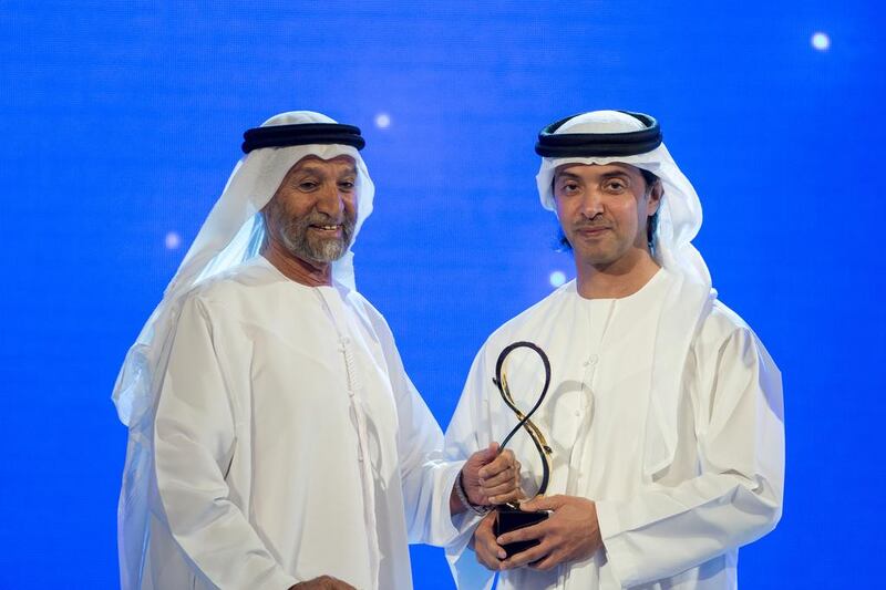 Sheikh Hazza bin Zayed presenting an award to Khadem Al Romaithi, who received the award on behalf of his late mother, Mouza bint Mroshed Al Subousi who was a beloved member of the community and a respected healer who used traditional herbal remedies to soothe and cure hundreds, free of charge. Described as a true pioneer, Mrs Al Subousi was a role model for women for her generation and those who came after her. Ryan Carter / Crown Prince Court — Abu Dhabi