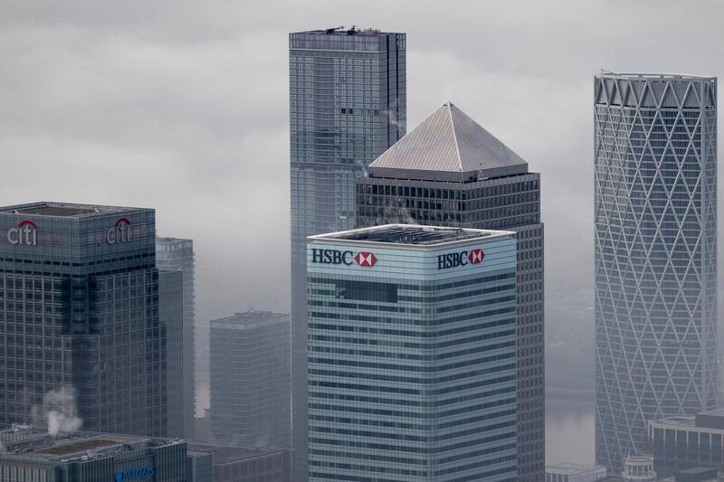 LONDON, ENGLAND - NOVEMBER 05: Fog shrouds the Canary Wharf business district including global financial institutions Citigroup Inc., State Street Corp., Barclays Plc, HSBC Holdings Plc and the commercial office block No. 1 Canada Square, on the Isle of Dogs on November 05, 2020 in London, England. England today began a second national lockdown to curb a surge in covid-19 cases, closing pubs, restaurants and an array of shops deemed non-essential. The new rules, which will expire on 2 December, also ban most indoor and outdoor household mixing and grass-roots sports. Unlike the first lockdown earlier this year, schools in England will remain open. (Photo by Dan Kitwood/Getty Images)