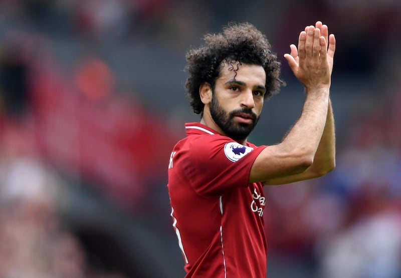 LIVERPOOL, ENGLAND - AUGUST 12:  Mohamed Salah of Liverpool applauds fans during the Premier League match between Liverpool FC and West Ham United at Anfield on August 12, 2018 in Liverpool, United Kingdom.  (Photo by Laurence Griffiths/Getty Images)