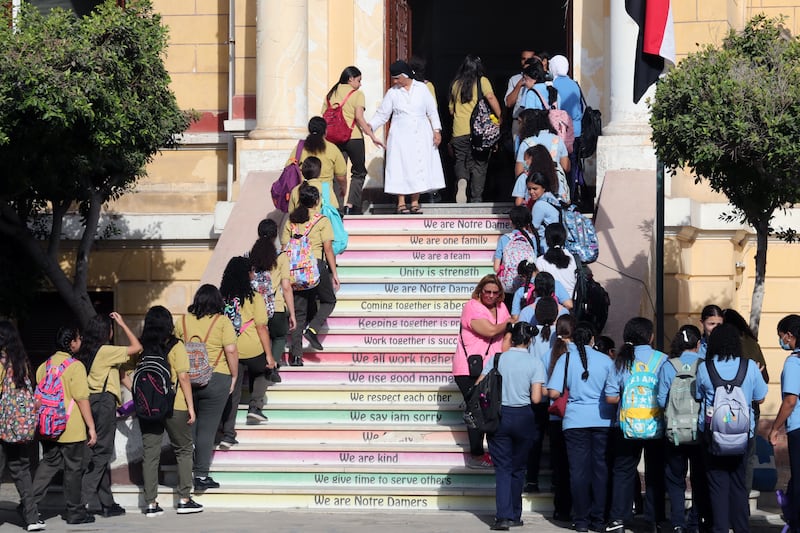 Pupils at Notre Dame School in Cairo attend the first day of the new academic year on October 1, 2022. EPA