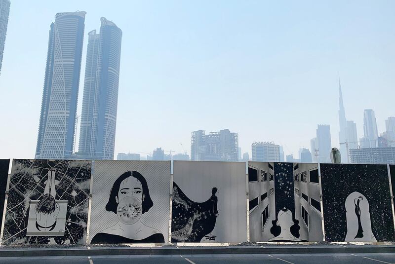 DUBAI, UNITED ARAB EMIRATES , September 9 – 2020 :- View of the graffiti pictures on the wall surrounding at Dubai Design District in Dubai.  (Pawan Singh / The National) For News/Online/Standalone/Instagram/Big Picture