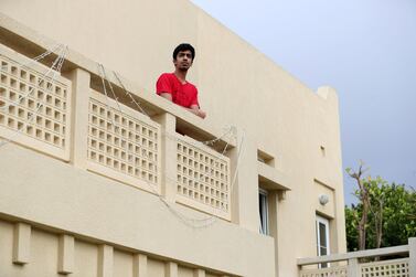 Abhishu Brahmecha, pictured in quarantine at his home in Dubai, returned from university in the United States on Saturday. Officials gave him special dispensation to enter the country when he found himself in limbo. Chris Whiteoak / The National