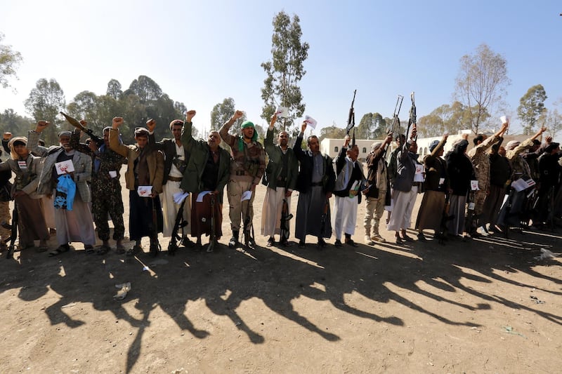 epa06400294 Houthi supporters attend a gathering marking the 1000th day of the conflict, in Sana'a, Yemen. 20 December 2017. According to reports, the Saudi-led military coalition has been incessantly bombing the Houthi rebels and their allies across the conflict-affected Arab country since March 2015 in an attempt to reinstate Yemen's internationally recognized government and crush the Houthis.  EPA/YAHYA ARHAB