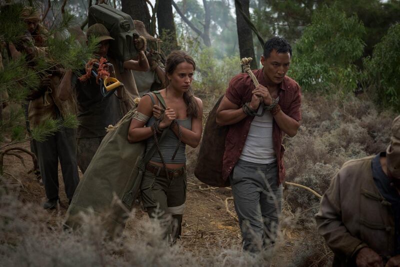 Alicia Vikander and Daniel Wu in a scene from "Tomb Raider." Graham Bartholomew / Warner Bros. Pictures