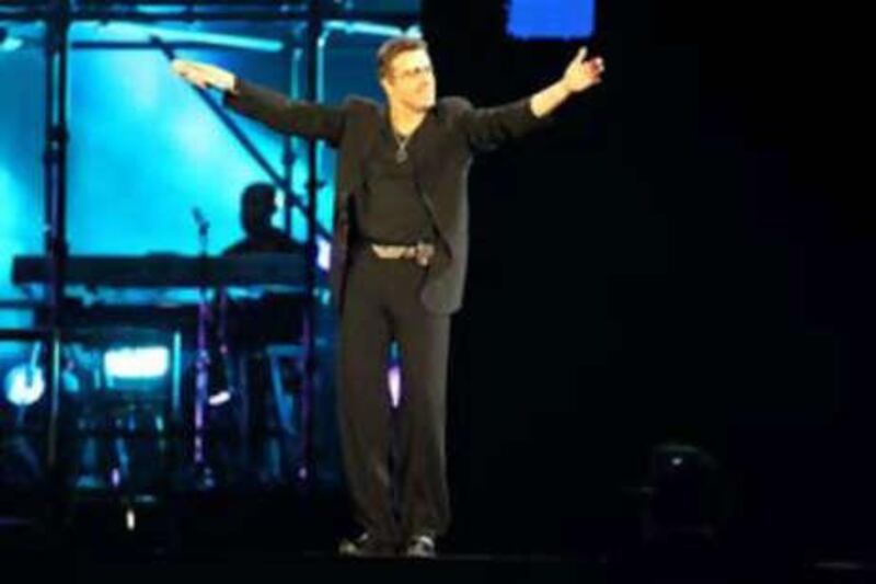 George Michael thrills the crowd at Zayed Sports City.