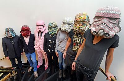 A collection of Stormtrooper helmets which featured as part of the 'Art Wars' Rogue 1 Exhibition. PA