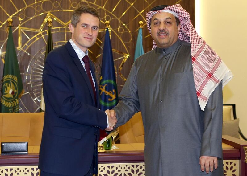 Qatar's Defence Minister Khalid bin Mohammed al-Attiyah (R) shakes hands with his British counterpart Gavin Williamson during an official agreement signing in the capital Doha on December 10, 2017.
Qatar signed an $8 billion (6.8 billion euros) deal with Britain on December 10 to buy 24 Typhoon fighters from Britain, which comes during the worst political crisis in the region for years.
Williamson said it was the biggest order for Typhoons in a decade, and it follows a billion-dollar deal signed by Qatar on December 7 to buy 12 French Dassault Aviation warplanes.
The deal also includes an intention for Qatar to buy further military equipment from Britain, namely the purchase of Hawk aircraft. / AFP PHOTO / STRINGER