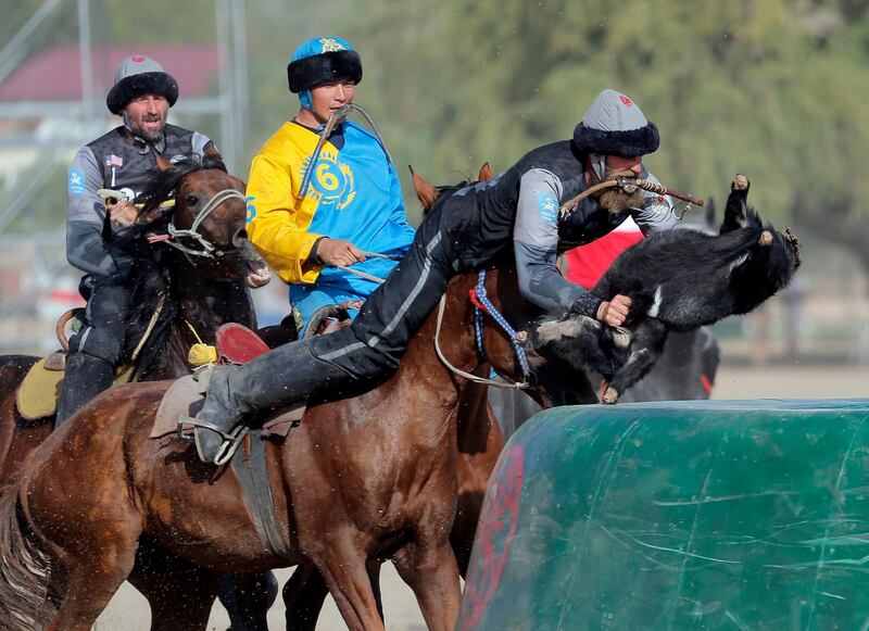 Kazakh and US horsemen take part in kok-boru. EPA