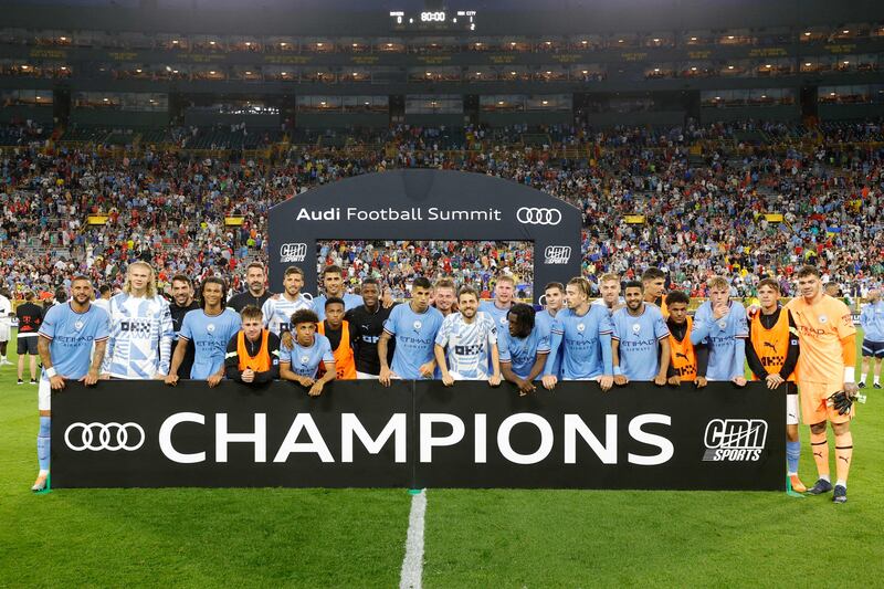 Manchester City players pose for photo after the friendly match against Bayern Munich. AFP