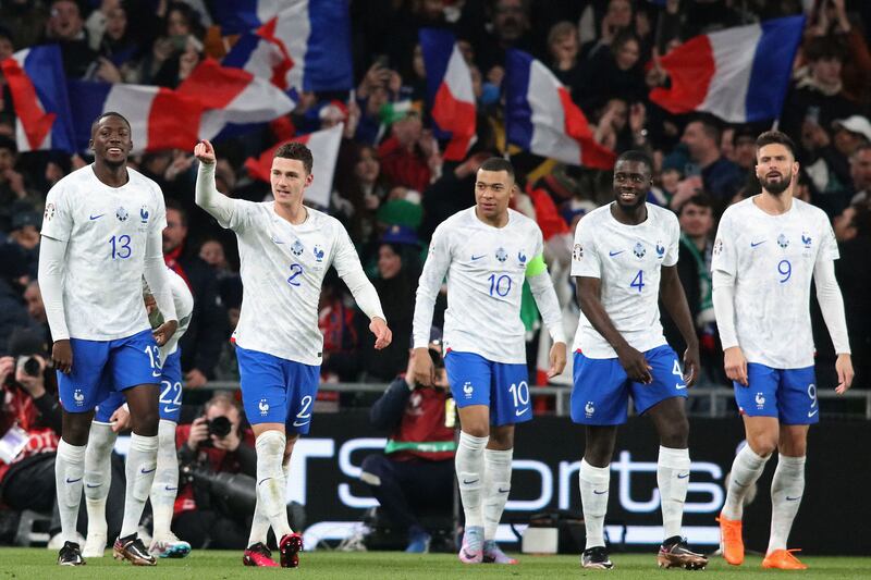 France defender Benjamin Pavard (2L) celebrates with teammates. AFP