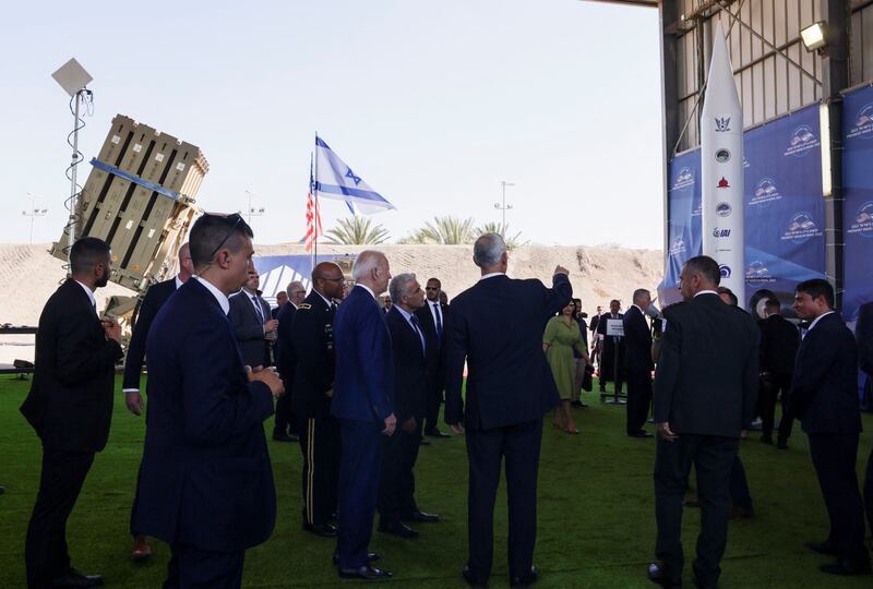 Israeli Prime Minister Yair Lapid and Mr Biden attend a briefing on the Iron Dome and Iron Beam Air Defence Systems. Reuters