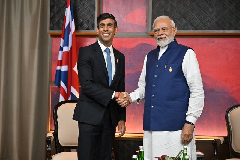 British Prime Minister Rishi Sunak, left, and Indian Prime Minister Narendra Modi meet at the G20 summit in Bali, Indonesia, in November last year. PA
