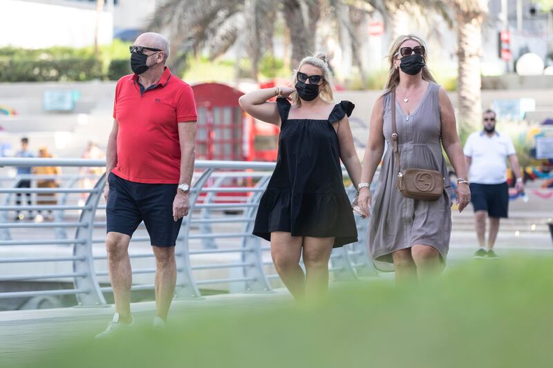 People will no longer have to wear face masks outside. The rule applies across the UAE. Antonie Robertson / The National