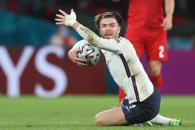 Grealish is unhappy after being fouled against the Danes. AFP