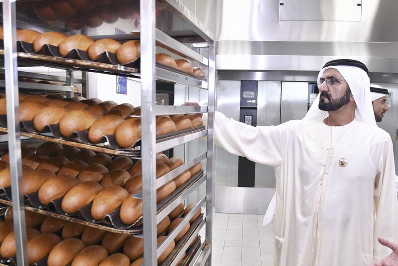 Sheikh Mohammed bin Rashid, Vice President and Ruler of Dubai, tours Skybake during his visit to Emirates Flight Catering in August 2017. Wam