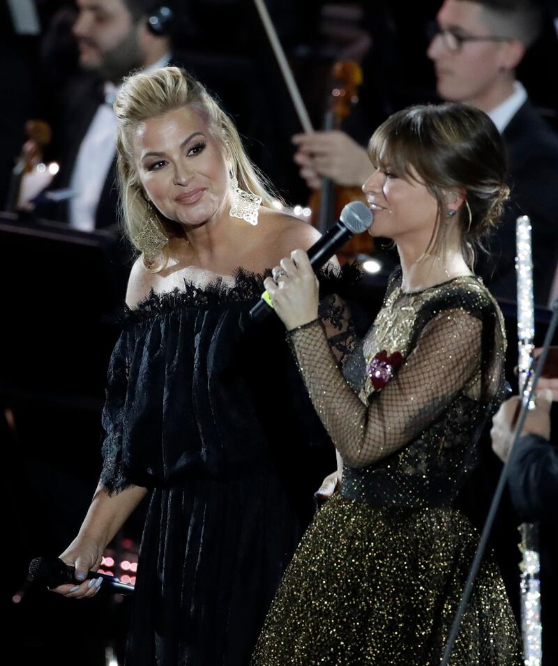 Pop singer Anastacia, left, performs with singer Alessandra Amoroso in the Paul VI Hall at the Vatican during the Christmas concert. AP Photo