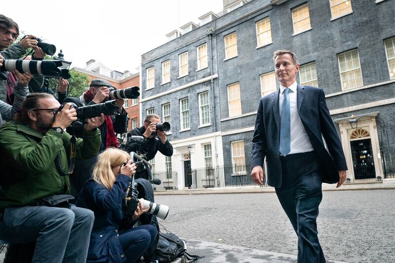 Jeremy Hunt leaves 10 Downing Street in London after he was appointed Chancellor of the Exchequer following the resignation of Kwasi Kwarteng. Here 'The National' looks back through Mr Hunt's political career. PA