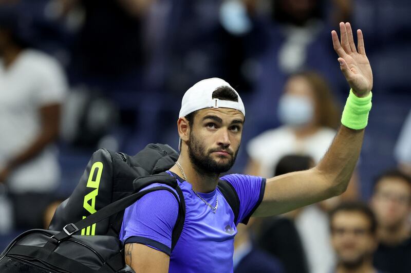 Matteo Berrettini of Italy waves as he leaves the court. AFP